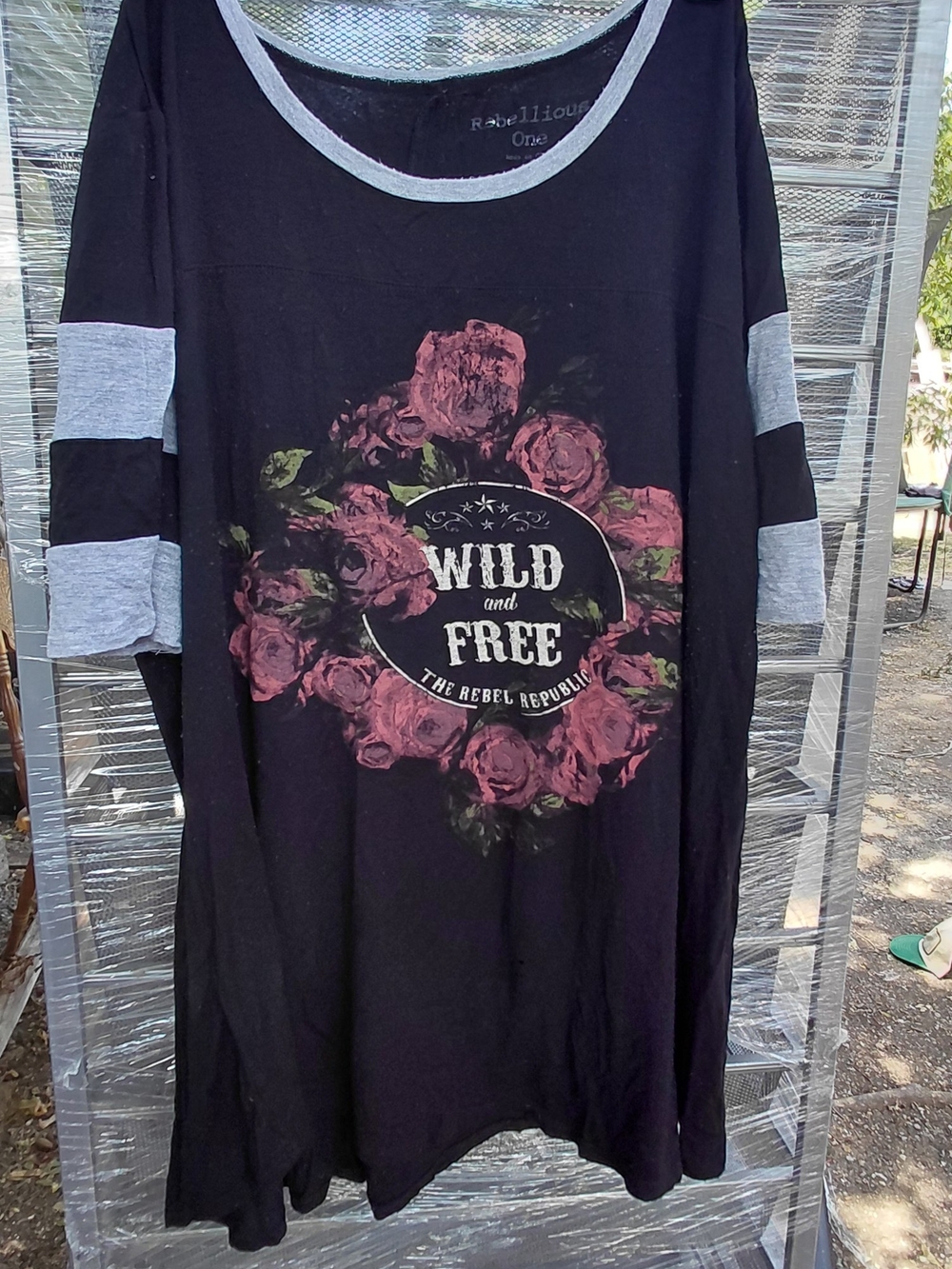 Rebellious One Black Long Sleeve Graphic Tee with Pink Floral Wreath